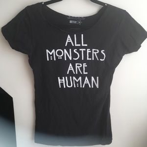 All monsters are human fitted black T-shirt